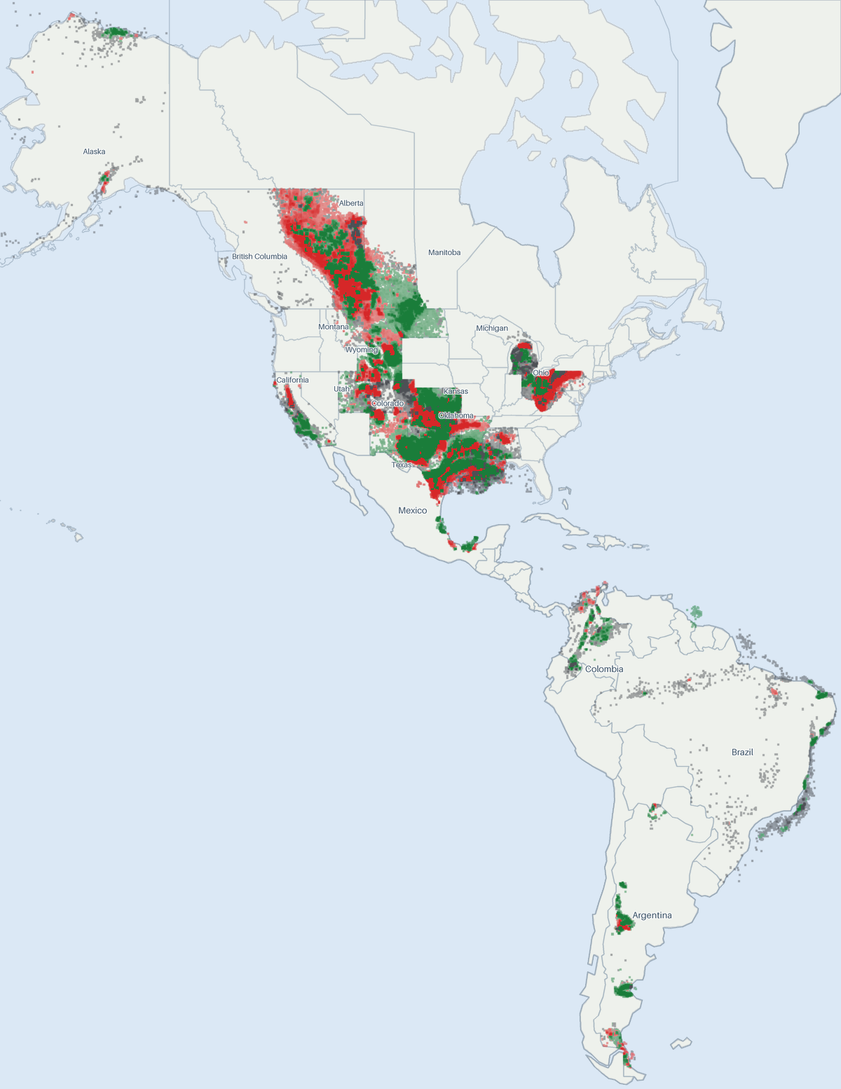 A map of the Americas showing 4,498,780 well locations for which CommoVision holds a published surface coordinate, each drawn where it is and colored by its primary product (green for oil, red for natural gas, gray where undetermined; a spot shared by more than one product shows the one with the most wells there), on a ground of land and water, with faint country, state and province outlines and place names for orientation.