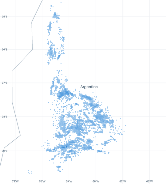 A map of 25,993 well locations inside the Vaca Muerta footprint for which CommoVision holds a published surface coordinate, each drawn where it is, over faint country outlines, place names and a latitude/longitude grid for orientation.