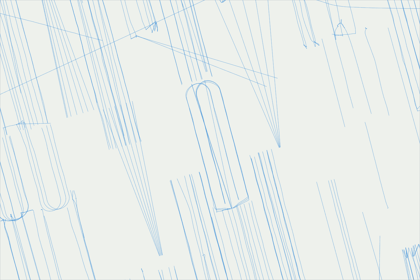 A map window over Upton County, Texas, with well laterals drawn from their directional surveys; 12 of them turn back beside themselves in a horseshoe shape.